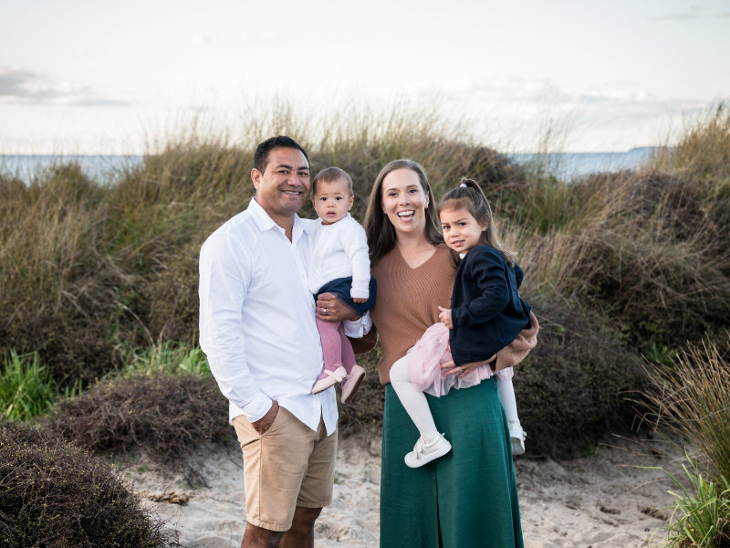 Richard and Lisa Nauer from Bay Building Solutions at Papamoa Beach with family